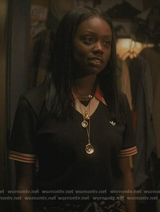 Keisha's black stripe trim polo on The Chi
