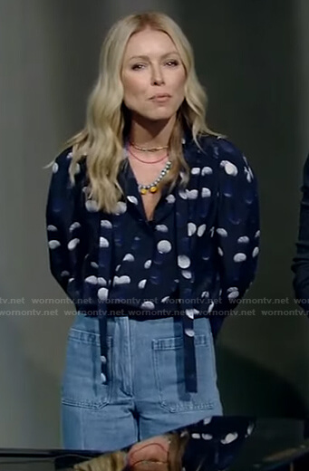 Kelly's blue polka dot tie neck blouse and jeans on Live with Kelly and Ryan