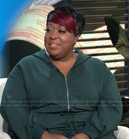 Loni's green hooded jumpsuit on E! News Daily Pop