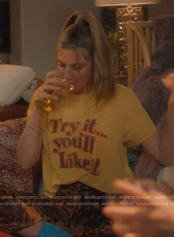 Nomi's yellow Try it graphic tee on Grown-ish