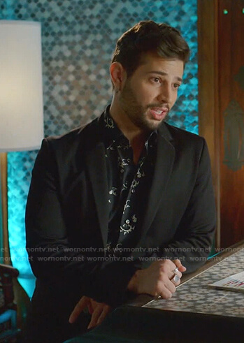 Sam's black printed shirt on Dynasty