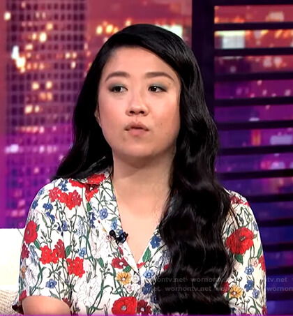 Sherry Cola's white floral shirt on E! News Nightly Pop