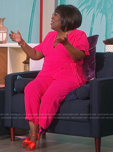 Sheryl's pink wrap top and pants on The Talk