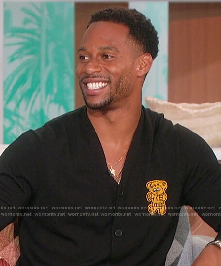 Victor Cruz's black teddy embroidered cardigan on The Talk