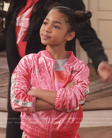 Ami's pink velour Nike trackshit on Family Reunion