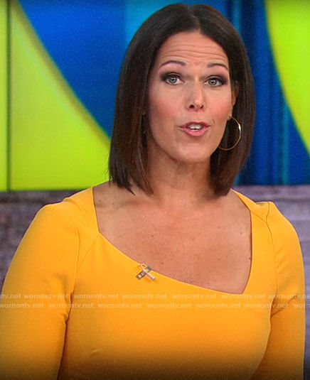 Dana Jacobson's orange dress with asymmetric neckline on CBS This Morning