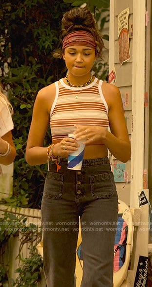 Kiara's striped crop top and black jeans on Outer Banks