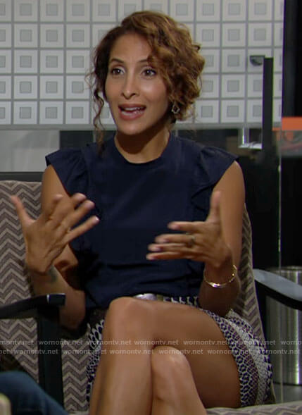 Lily's navy ruffled top and mixed print skirt on The Young and the Restless
