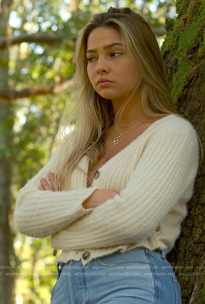 Sarah's white cardigan, yellow eyelet top and two tone jeans on Outer Banks