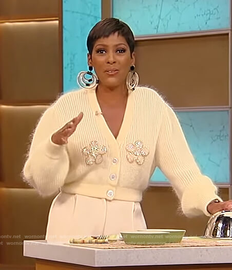 Tamron's yellow cropped floral embellished cardigan on Tamron Hall Show