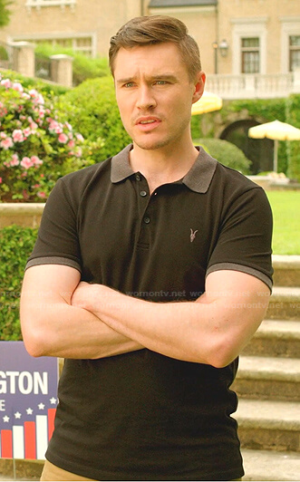 Adam's black polo shirt on Dynasty
