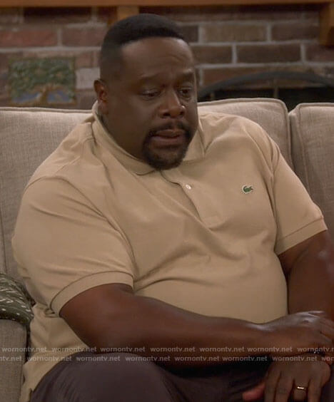 Calvin's camel polo shirt on The Neighborhood