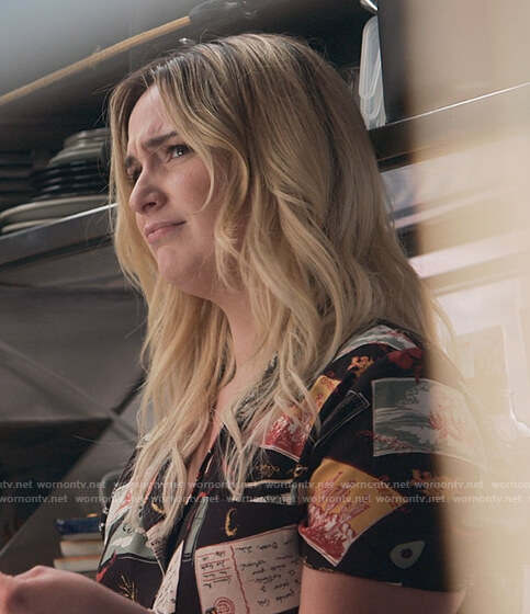 Davia's black postcard print blouse on Good Trouble