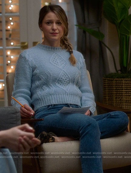 Kara's blue cable knit sweater and plaid loafers on Supergirl
