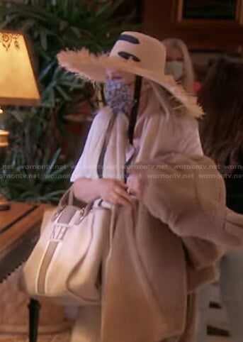 Kathy's straw hat and tote bag on The Real Housewives of Beverly Hills