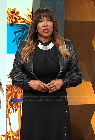 Kym's black ribbed dress and cropped leather jacket on E! News Daily Pop