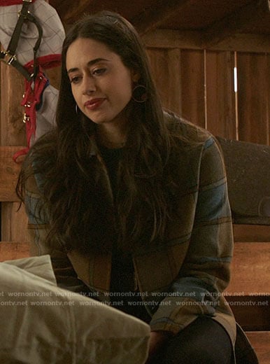 Liz's brown and blue checked coat on Roswell New Mexico