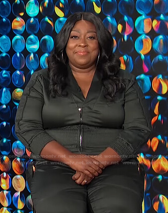 Loni's grey smocked waist jumpsuit on E! News