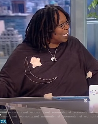 Whoopi's black moon and star sweater on The View