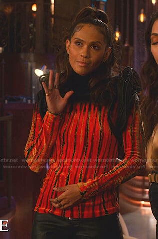 Maze's red tie dye turtleneck top on Lucifer