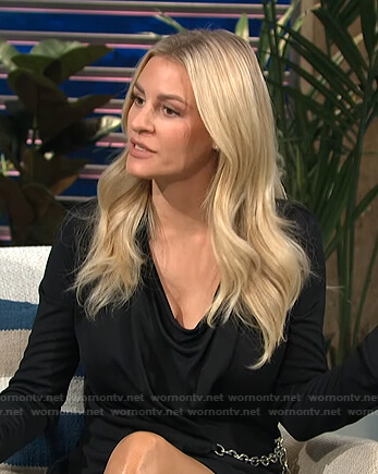 Morgan's black chain-detail wrap dress on E! News Daily Pop
