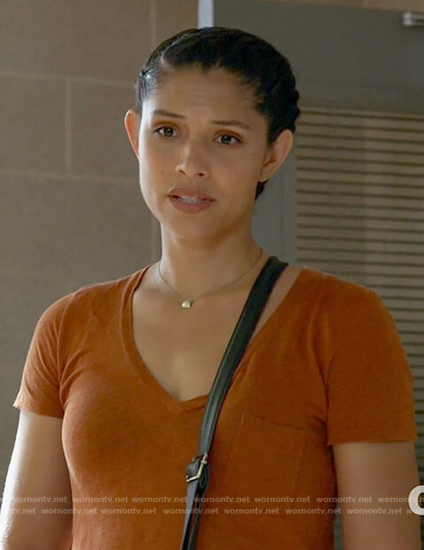 Stella's orange v-neck tee on Chicago Fire