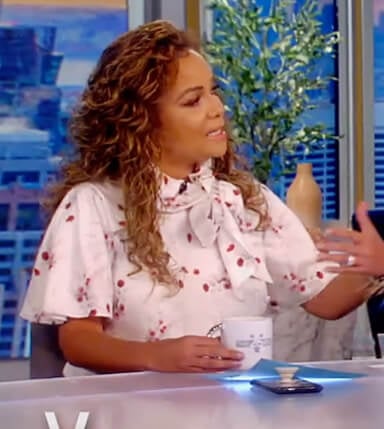 Sunny's white floral tie neck top on The View