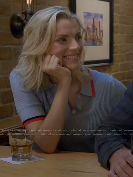 Sylvie's blue polo top with red trim on Chicago Fire