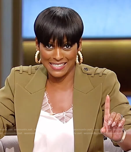 Tamron's green blazer and lace trim cami on Tamron Hall Show