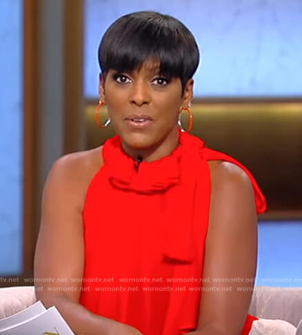 Tamron's red tie neck top on Tamron Hall Show