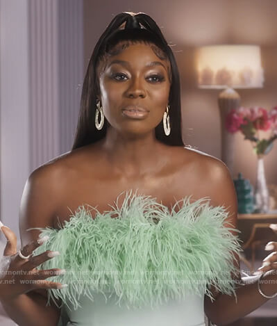 Wendy's feather trim jumpsuit on The Real Housewives of Potomac