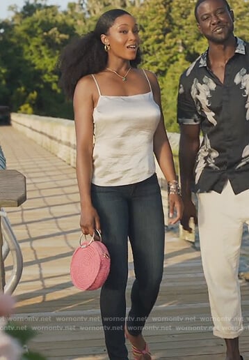 Angela's pink round straw bag on Our Kind of People