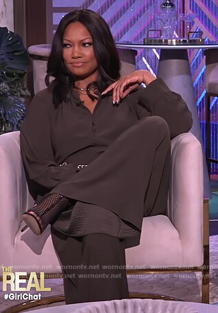 Garcelle's olive tie waist jumpsuit on The Real