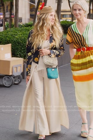 Carrie's ivory jumpsuit and floral jacket on And Just Like That