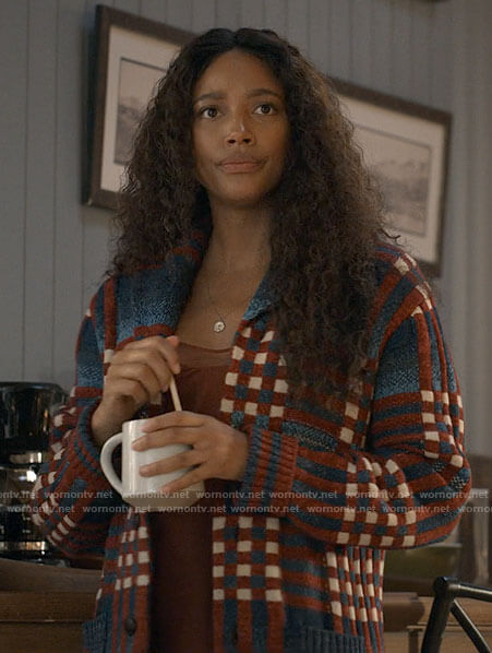 Cassie's checked cardigan and orange cami on Big Sky