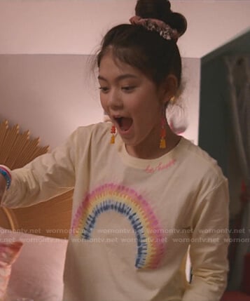 Claudia's yellow rainbow print top on The Baby-Sitters Club