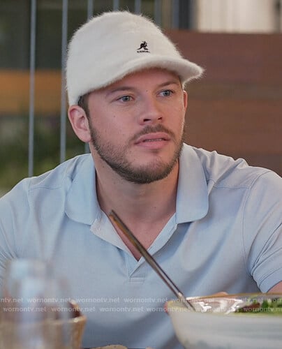 Connor's white kangaroo logo cap on Home Economics