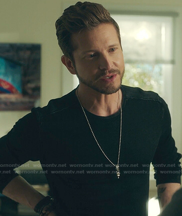 Conrad's black long sleeve shirt on The Resident