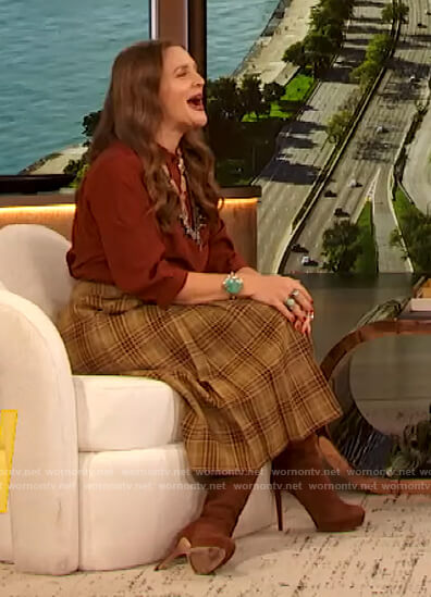 Drew's red silk blouse and plaid skirt on The Drew Barrymore Show