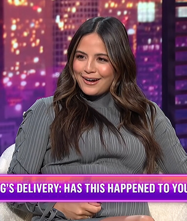 Erin's grey lace-up sleeve dress on E! News Nightly Pop