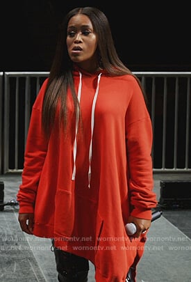 Brianna's red oversized hoodie on Queens