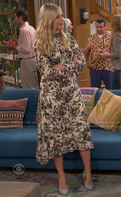 Gemma's white floral midi dress on The Neighborhood