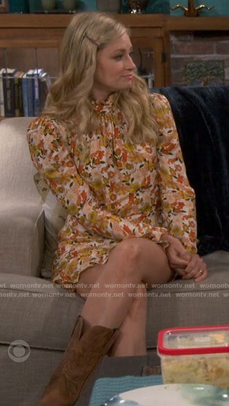 Gemma's orange floral dress on The Neighborhood