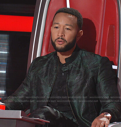 John's black palm tree print shirt and bomber jacket on The Voice