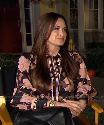 Kyle's black contrast floral blouse on E! News Daily Pop