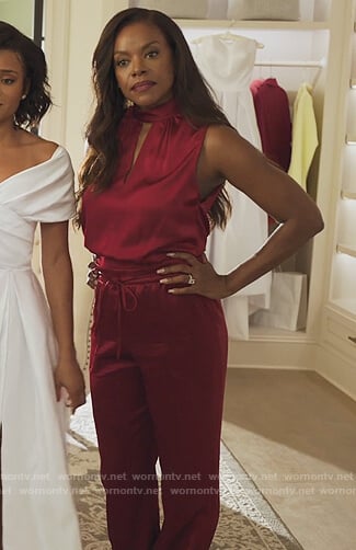 Leah's red satin keyhole top and pants on Our Kind of People