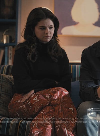 Mabel's red marble printed pants on Only Murders in the Building