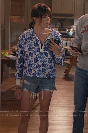 Marina's blue floral hoodie on Home Economics