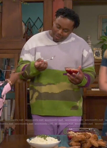 Marty's graphic sweater on The Neighborhood