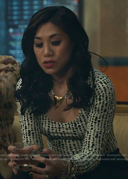 Mel's black and white dotted print top on The Equalizer